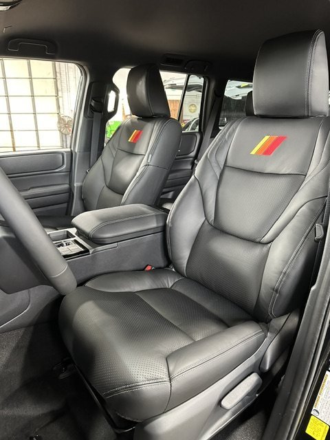 Black leather seats with diamond stitching