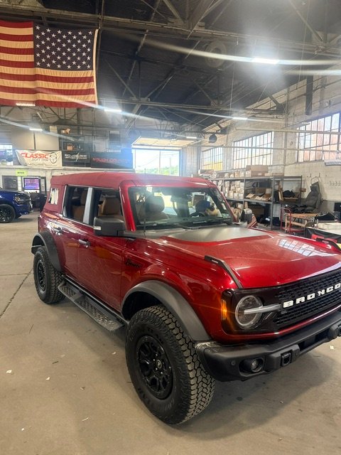 Red Ford Bronco with a Bestop eTop installed, in the Classic Soft Trim shop