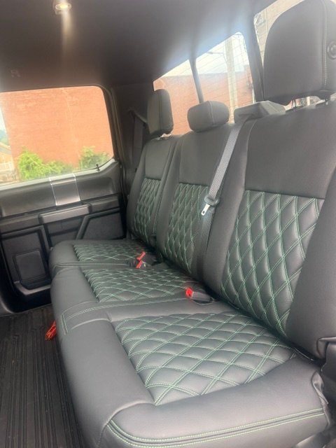 Ford F-150 rear bench in black leather with green diamond stitching