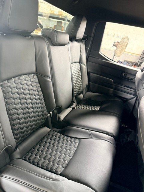 Toyota Tacoma rear seats in black leather with honeycomb-stitched inserts